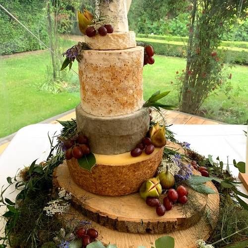The client requested a cheese tower to be displayed during the day and was broken down into a cheese table in the evening. 