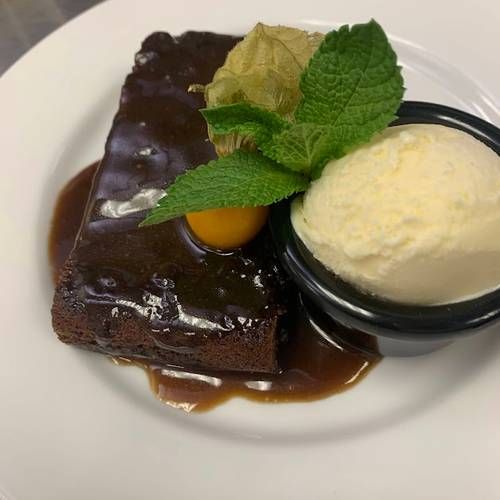 Shefs sticky toffee pudding, toffee sauce & vanilla ice cream   